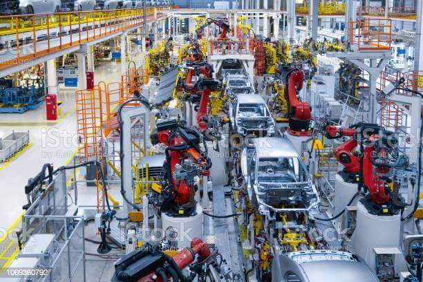 A car assembly line is run by machines
