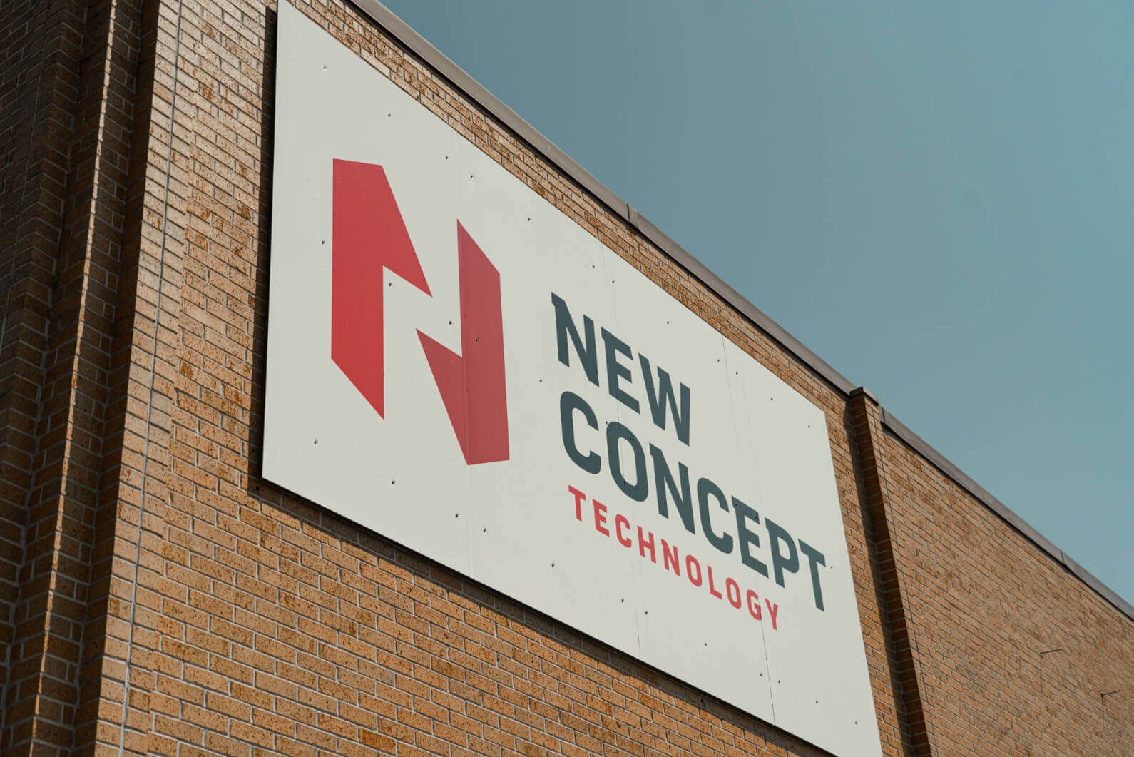 New Concept Technology Logo On Building